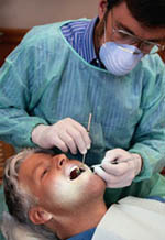 Picture of man during a routine teeth cleaning
