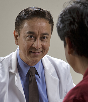 Person talking to doctor.