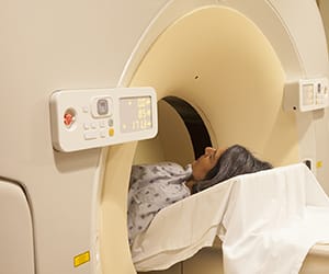 Person having CT scan.