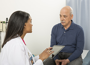 Man talking to healthcare provider.