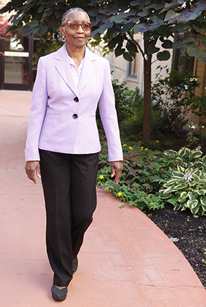 Woman walking outdoors.